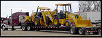 Cost to ship a backhoe loader